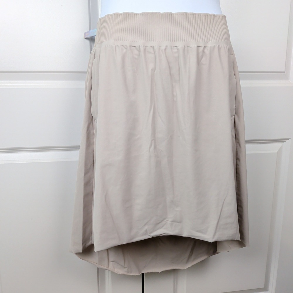 Athleta Cosmic Skirt Beige High Low Ribbed Waist Pockets Womens Large